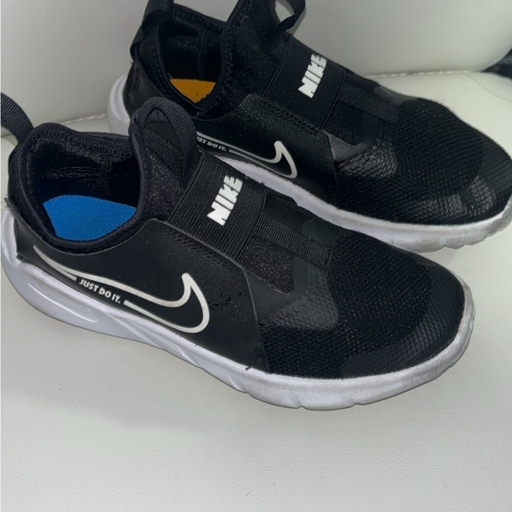 Nike Black and White Slip-On Sneakers